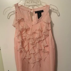 Pink ruffled blouse